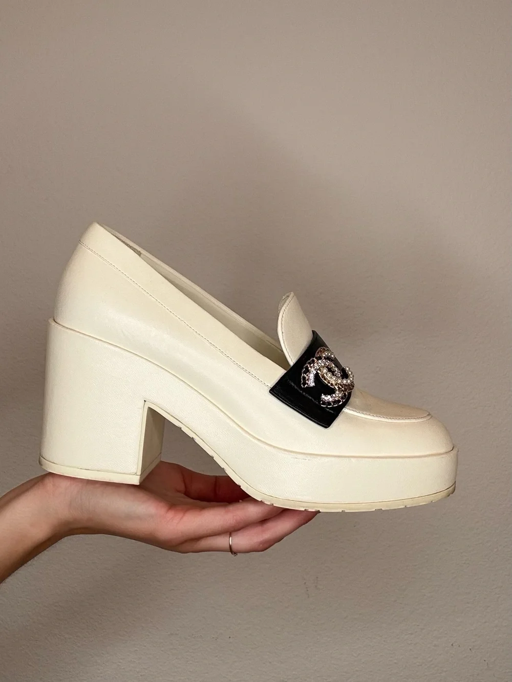 CHANEL White Leather Loafers with Black Band and Crystal CC Emblem